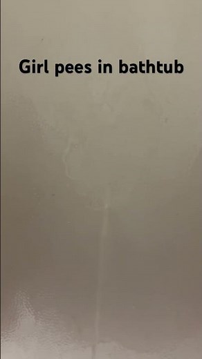Girl pees in bathtub