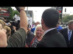 Preacher yells at crowd gathered for marriage license case