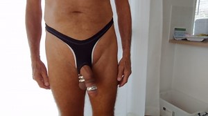 Putting on the big glans ring.