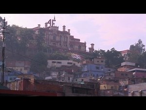 Venezuelans proud to have Chavez's body in district