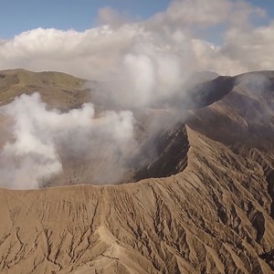Aerial view of Mt Bromo volcano, shot with Mavic Pro drone. > Watch full Bromo by Drone movie https://youtu.be/wAkqdgq3YAs. > FREE Mt Bromo travel/photo/video ebook www.travelimagez.com/free-ebooks | Travel Imagez