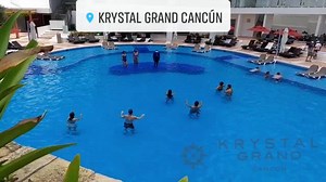 Our guests are having a very active 🏊‍♂️aquaerobics session with the entertainment staff at the main pool🌊! #aquaerobics #pool #beach #entertainment #mexico #vacation #KrystalGrandCancun | Krystal Grand Cancún