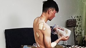 Cyclist strips naked to reveal injuries in crash that left rival needing oxygen