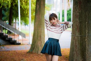 4K Asian Woman in Sweater and Skirt Rare Gallery wallpaper