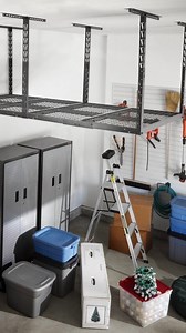 Add a new dimension to garage organization with the Gladiator® Overhead GearLoft™ Storage Rack. The adjustable height allows for up to 96 cu. ft. of storage, and the rack holds up to 1000 lbs of evenly distributed weight. You’ll have plenty of room to keep your holiday gear out of sight until next year. | Gladiator