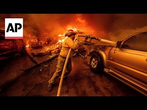 Firefighters battle Los Angeles wildfires as death toll expected to rise