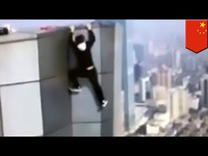 Chinese rooftop climber falls performing skyscraper stunt - TomoNews