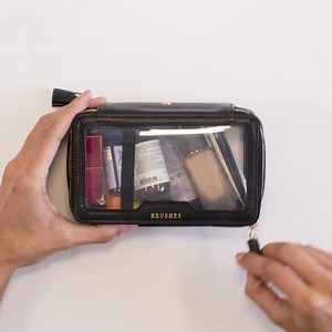 1.3K views · 18 reactions | On-the-go organisation. The clear Make-Up Case has two zipped compartments; one for your make-up essentials and one for your favourite brushes, to keep everything organised and easy to see for travel or out and about. Discover the Make-Up Case: https://anyahindmarch.visitlink.me/DGl6KZ #AnyaHindmarch | Anya Hindmarch | Facebook