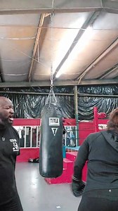 12pm class getting some Boxing Mitt action after a heavy bag Tabata workout!! Putting that Warrior Woman icing on the cake! Warrior Warehouse STRONG!! | The Warrior Warehouse