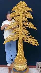 41K views · 358 reactions | Watch this young girl weave a magnificent money tree, artfully transforming 1,000 metal wires into delicate branches adorned with shimmering leaves. #FunChina #Heritage | China Plus America | Facebook