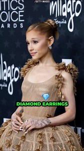 Ariana Grande Stuns In Floral Cage Dress At The 2025 Critics Choice Awards.