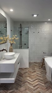 3.9K views · 14 reactions | Coastal themes seem to be all the buzz this year, and we're here for it!  Better Built Homes perfectly captured the coastal essence of rounded waves with our curved Kado basin, complementing sandy earthy tones echoed in the Milli brushed bronze tapware and textured tiling. Reece featured products : Kado Lussi bath, Kado Lussi basin, Milli brushed bronze tapware and Milli Mood shower | Reece Bathrooms | Facebook