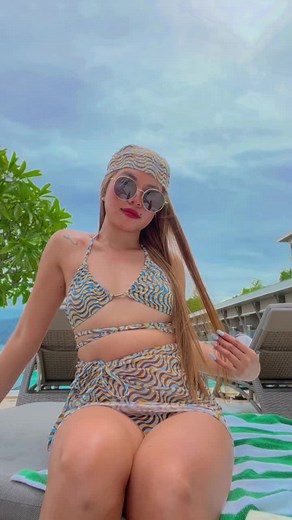 Sunbathing in Style: Beach Bikini Moments