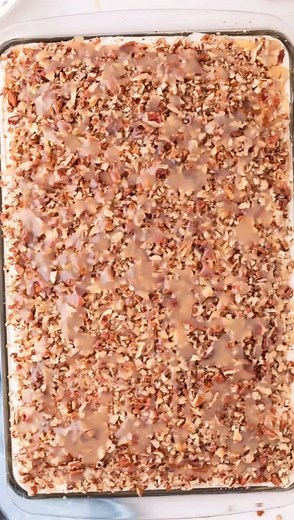 Indulge in a decadent treat with our Caramel Turtle Chocolate Poke Cake! 🍫🐢 This rich and gooey cake is perfect for satisfying your chocolate cravings. Find the full recipe on our website and enjoy layers of chocolate, caramel, and pecans in every bite. #ChocolatePokeCake #CaramelTurtleCake #DecadentDesserts | MidgetMomma.com