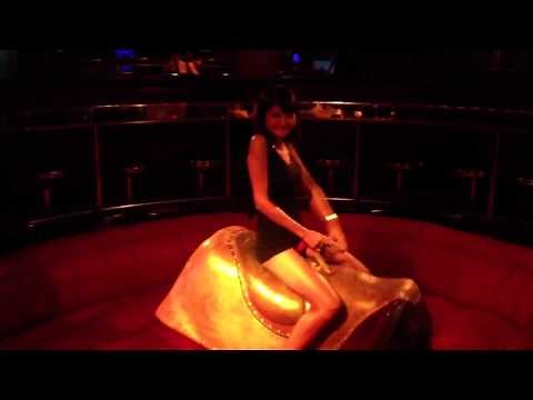 Nick riding the mechanical bull at Carousel Bar in Nana Pla