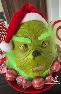 The grinch tree topper