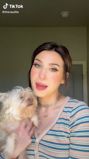 Cuddling a Cute Fluffy Dog at Home