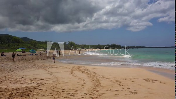 Vacationers at the Makena Beach State Park (Big Beach). Maui, Hawaii, USA