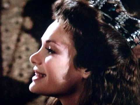 " Nice Black Split Dress " 1 / 3 : Mary Crosby in " The Ice Pirates " 1984