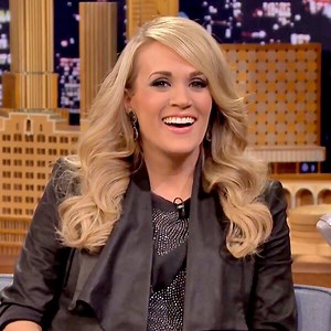Pregnant Carrie Underwood Sings to Baby Bump, Says Body Is "Definitely Not Mine Right Now!"