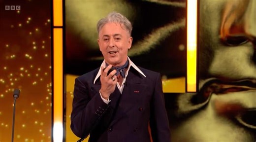 Baftas ‘heckling’: What really happened during Alan Cumming’s monologue? - NewsBreak