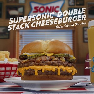 The SuperSONIC® Double Stack Cheeseburger! 🍔 Double the beef with an irresistible cheesy center 😋 Order yours today in the app! Limited time only at participating SONIC® Drive-Ins. ™ & © 2023 America’s Drive-In Brand Properties LLC. | Sonic Drive-In