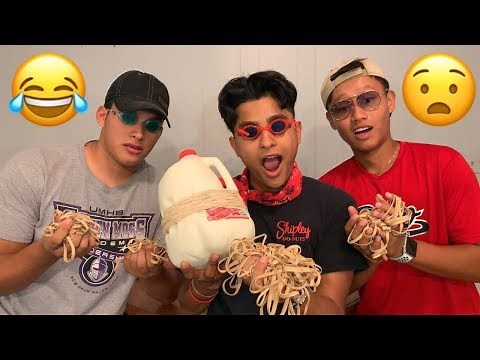 Guys explode a jug of milk using rubber bands **MUST WATCH**