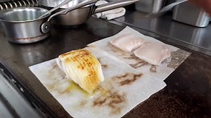 Stan, our fish chef, getting some colour (and butter) on the skate on the hot plate during lunch service. To go in a dish with bonito vinegar, charred broccoli and mussels. | Chapter One Restaurant
