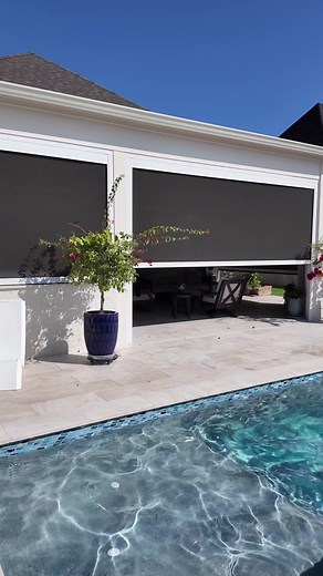 Nothing gives the perfect patio vibes like motorized screens… and a puppy who approves. 🐶☀️ | Acadiana Kitchen & Shutters LLC