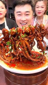 eating spicy squid and boiled beef head with sauce look so very delicious food | NANA