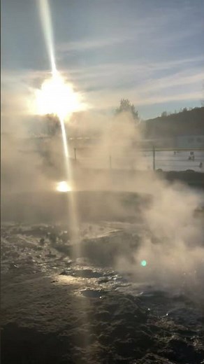 The Secret Lagoon, Iceland. Natural hot spring swimming pool. Geothermally heated
