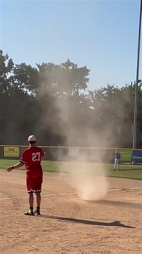 A dust devil brought a Kansas baseball game to a halt on July 13. Unlike tornadoes, dust devils form in fair weather on sunny and hot days with somewhat calm winds. 📷 Travis Horn | FOX Weather
