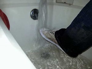 Wetlook CrazyForWetness: Toria washing Keds in shower