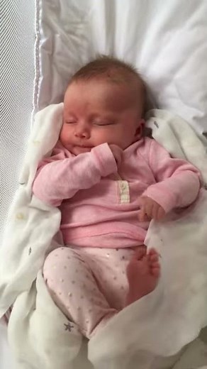 Newborn baby waking up