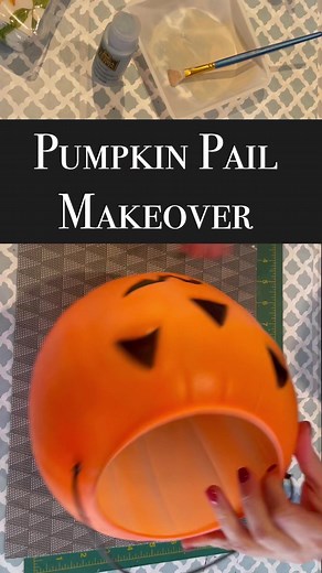 Turn a Halloween candy pail into a decor piece with paint and #dollartree florals 🎃 #diyhalloween #Halloween #halloweendecorations #halloweendecor #upcycled #dollartreediy | The Craftessa
