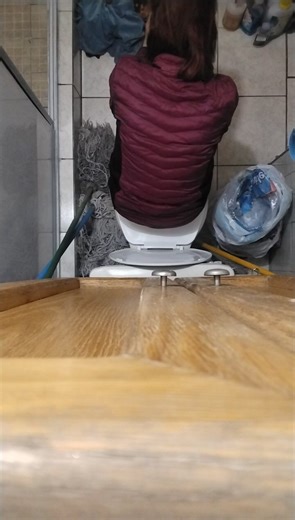 Mother pooping big and solid turds