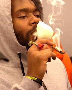 The wave of cannabis legalizations has deepened divides and complicated the marijuana industry. Corporate weed is thriving but the black market for cannabis still looms large. | VICE