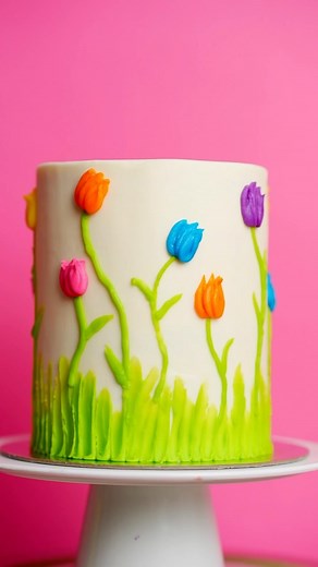 🌷Spring is in the air! 🌷 celebrate sunshine with this magical explosion cake ✨🌈 #flourshop #cake #cakedecorating #bts #flowercake #piping | Flour Shop
