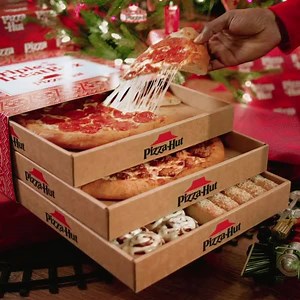 Pulling off last-minute holiday shopping calls for a Triple Treat Box® cheese pullllllll. | Pizza Hut