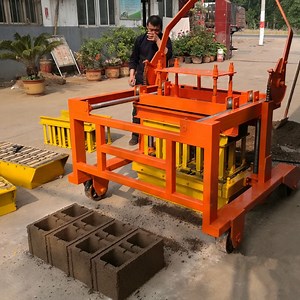 [Hot Item] Egg Layer Egg Laying Concrete Mobile Hollow Block Making Machine Movable Brick Making Machine