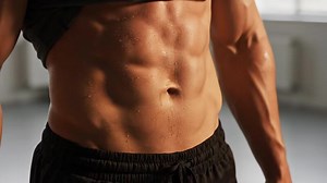 Download Man's Ripped Torso Shows Defined Muscles and Sweat After Workout at the Gym for free