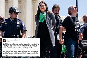 AOC escorted by police away from the Supreme Court
