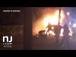 Footage shows police kicking victim of fiery crash (Warning: video contains graphic content)