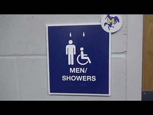 the Legacy Center Lake Charles men's Coach Locker Room and men's Showers