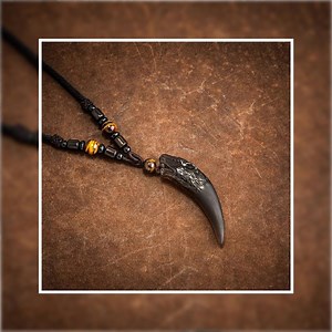 Sleek sellouts! 🤓. Order Natural Stone and Obsidian 'Wolf Tooth' Necklace at $38.95 from https://norsespirit.com/products/natural-stone-and-obsidian-wolf-tooth-necklace #love #Rollo #norsespirit #vikingshield #amulet #ivarragnarsson #vikingstyle #thor #asatru #vikings | Norse Spirit