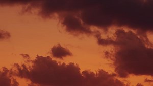 Dramatic Sunset with Dark Clouds