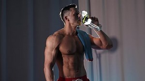 clip-1071186748-sports-training---athletic-muscular-shirtless-man