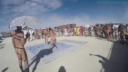 naked oil wrestling at Burning Man 2016