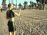 Girl walks around Venice Beach in painted on gym wear