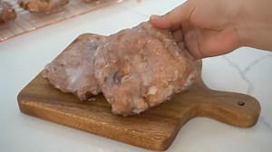 Crunchy APPLE FRITTERS How to make the best Crunchy Apple Fritters. Here's what you'll need: 2 cups all purpose flour (250g) 1 tbsp sugar (15g) 1/2 tsp salt (3g) 1 tsp instant yeast (3g) 1/2 cup milk (125ml) 1 large egg 2 tbsp unsalted butter (24g) HALF-COOKED APPLES: 1 tbsp butter (salted or unsalted will do) 1 and ½ cup diced apples (honey crisp or granny smith) 1 tbsp sugar (15g) 1/2 tsp cinnamon powder (1g) a pinch of salt 1 tbsp lemon juice ½ tsp vanilla extract GLAZE: 2 cups icing sugar (2